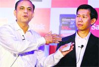 Sandisk Corporations India country manager Rajesh Gupta (left) and director Asia Pacific Hon Wai Cheah at the launch of the worlds fastest, high capacity memory card in Mumbai on Wednesday. PTI 