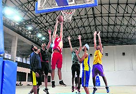 Players practise at the indoor basketball stadium of the Sports Complex, Sector 42 in Chandigarh on Monday.