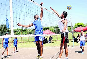 A match in progress during the Inter-College Volleyball Championship on Panjab University campus in Chandigarh, on Wednesday. 