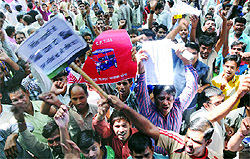 Owners of e-rickshaws demanding the lifting off ban on their vehicles, at Jantar Mantar in New Delhi on Wednesday