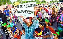 Future unsure, present tense: Children of protesters in the ongoing anti-government sit-in in front of the Parliament House in Islamabad