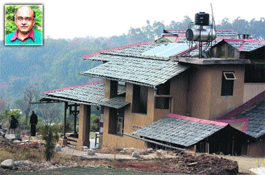 The land that belongs to the Prashant Bhushan (inset) in Palampur.