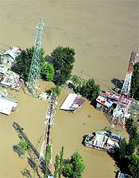 A unit of mobile towers submerged in the floodwaters in Srinagar.