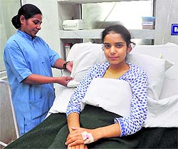 Rabia is all smiles at 92 Base Camp Hospital of Badami Bagh Cantonment in Srinagar on Wednesday.