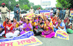 The protesters outside the office of the Deputy Commissioner in Ludhiana on Wednesday.