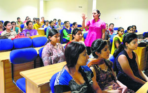 A speaker adresses students during a workshop on Enhancing creative skills at the Khalsa Institute of Management and Technology in Ludhiana. 