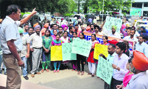 Protesters at the Mini-Secretariat in Ludhiana. 