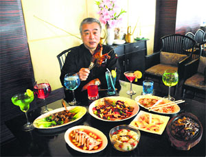 Chef Yaun Hi Shi with a sumptuous spread