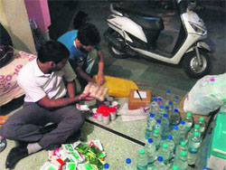 MAD volunteers collect relief material for J&K flood victims in Dehradun on Wednesday. A Tribune photograph
