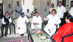 Chief Minister Harish Rawat at a meeting with Union Water Resources Minister Uma Bharti in Dehradun on Wednesday. State Drinking Water Minister Mantri Prasad Naithani and Chief Secretary Subhash Kumar are also seen. A Tribune photograph