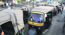 Autorickshaws parked in the middle of a road creating traffic problem near the bus stand in Bathinda on Thursday.