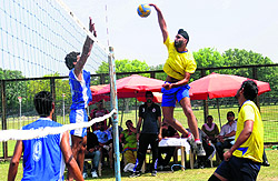Players in action during a match of the Panjab University Inter-College Volleyball Championship for Men (A-division) in Chandigarh on Thursday