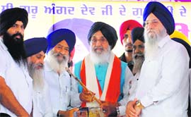 CM Parkash Singh Badal being felicitated at the SAD rally in Khadoor Sahib on Thursday.