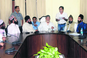 Chief Minister Harish Rawat meets the Uttarakhand Ulema Council office bearers in Dehradun on Thursday. 
