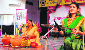 Students play folk instruments during the Youth Festival at GNDU in Amritsar on Friday.