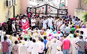 Police stop MGNREGA Contract Employees Union and e-panchayat Employees Union workers from holding a protest march in Bathinda on Friday.