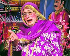 Saroop Parinda, also known as Chachi Chatro, performs during a Ramlila show at Kikar Bazaar in Bathinda.