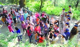 Girl students raise slogans during a protest in Himachal Pradesh University in Shimla on Friday.