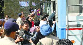 Students scuffle with cops during a protest in Himachal Pradesh University in Shimla on Friday.