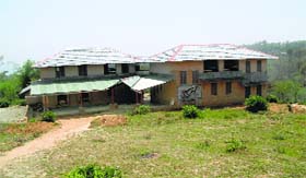 Classrooms under construction on the Bhushan society land.