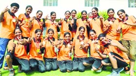 The winning team in a jubilant mood.
