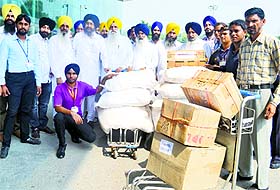 SGPC team taking relief material to Jammu and Kashmir on Friday.