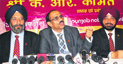 PNB MD KR Kamat (centre) addresses mediapersons in Amritsar on Saturday. Photo: RK Soni