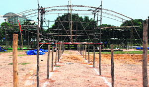 Workers make arrangements for Ramlila at a ground near Shalimar Mall in Panchkula on Saturday.