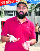 Dr Gaganjit Singh at the Phase I police station in Mohali on Saturday.
