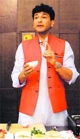 Chef Vikas Khanna gives cooking tips to students of the LPU on Saturday. 