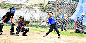 peak action: Players in action during a match in a national level baseball tournament at the Rangers Ground in Dehradun on Saturday. Tribune photo: Abhyudaya Kotnala