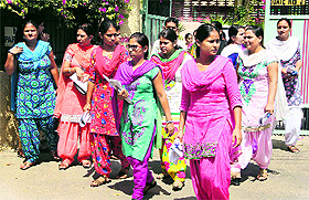 Candidate come out of St Josephs School after the Central Teacher Eligibility Test entrance exam in Bathinda on Sunday.
