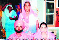 Jaswinder and Simran during their wedding at Ranjit Singh Theri village in Sirsa district