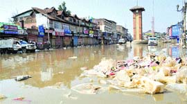 TRAIL OF DESTRUCTION: The flood-hit Lal Chowk area in Srinagar on Sunday.