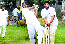 A match in progress during the Panjab University inter-college cricket meet in Ludhiana on Sunday