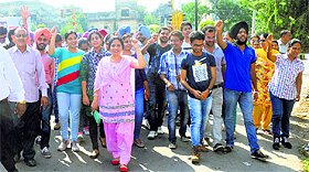 Students of Chintpurni Medical College and parents protest in Jalandhar on Sunday.