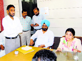 Congress MLA Kuljeet Singh Nagra and SDM Pooja Syal Grewal during a meeting at Sirhind Municipal Council office. 