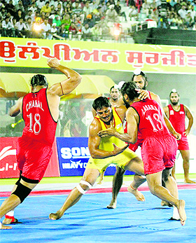 The match between Khalsa Warriors and Yo Yo Tigers in progress during WKL in Jalandhar on Sunday. 
