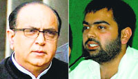 Irrigation Minister Ajay Yadav (L) and his son Chiranjeev Rao 