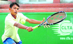 Shashikant Rajput returns a shot during the final match at the CLTA courts, Sector 10, in Chandigarh on Tuesday.