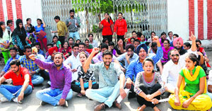 Supporters of the Panjab University Students Union protest at the PU in Chandigarh on Tuesday.