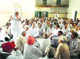 Representatives of the Dahiya khap hold a meeting at Kharkhoda on Monday. 