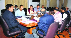 Industries Minister Mukesh Agnihotri presides over a meeting of the State Industrial Development Corporation in Shimla on Tuesday.
