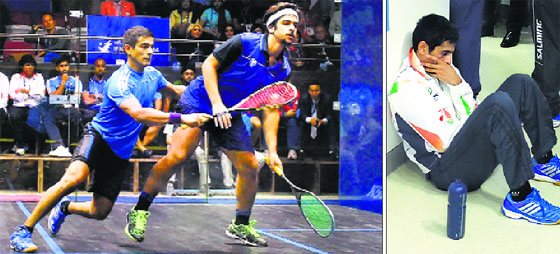Saurav Ghosal tries to reach the ball during his final against Kuwaits Abdullah Al Muzayen (PTI); (right) Ghosal sits in despair after losing the match on Tuesday.
