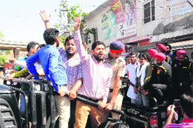 Activists of religious organisations being rounded up by the police near Patiala phatak in Bathinda on Wednesday. 