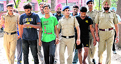 The accused at the Sector 36 police station in Chandigarh on Wednesday