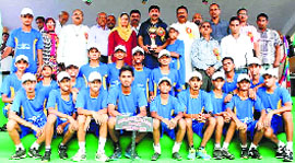 Industries Minister Mukesh Agnihotri with the winning team at Dulehar in Una on Wednesday.