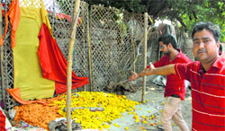 Flower venders show their demolished shops at Gopal Nagar in Jalandhar on Wednesday. Photo: Sarabjit Singh