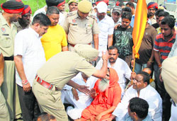 Hindu organisations hold a protest on a railway track in Jalandhar on Wednesday. Photo: Sarabjit Singh