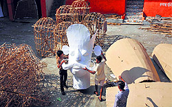 Artists busy making the effigy of demon king Ravana ahead of Dasehra in Jammu